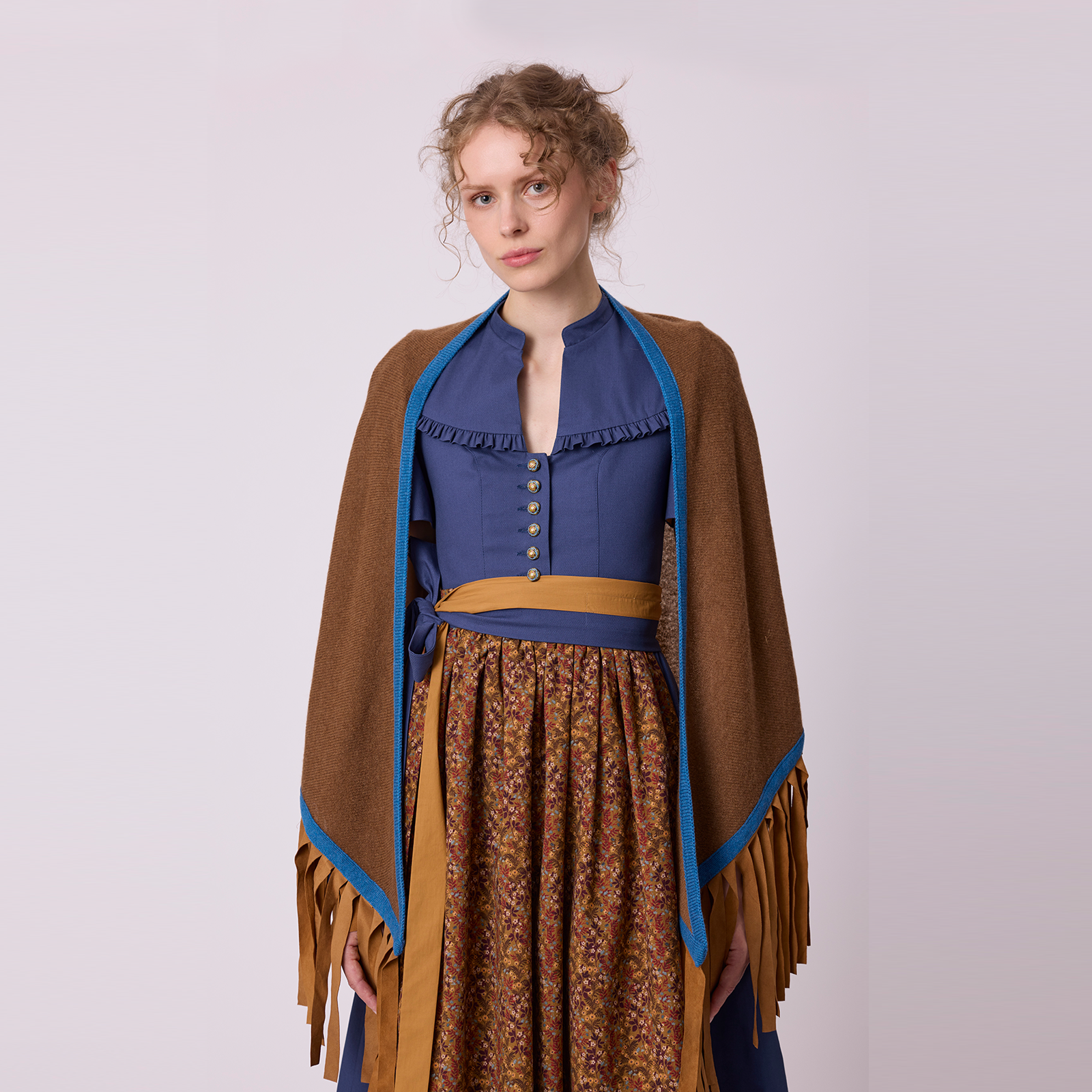 Dirndl by Antonia Zander styled with cashmere layering, blending tradition and contemporary design.