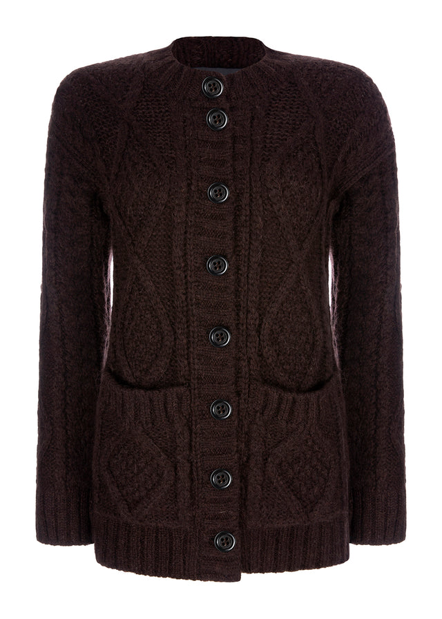 cable knit cardigan.made in italy. traditional craft with statement horn buttons
